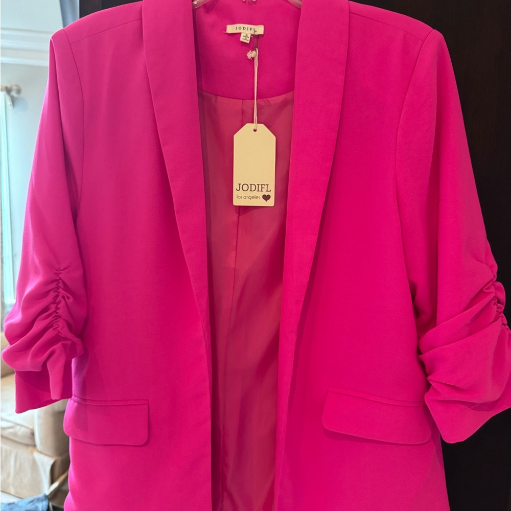Brand new with tags never worn hot pink blazer.  Jodifl Los Angeles